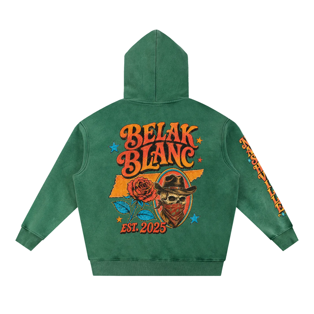A green hooded sweatshirt shown from the back on a white background, featuring a large colorful graphic with the words 'BELAK BLANC', a skull in a cowboy hat, a rose, stars, and 'EST. 2025'.