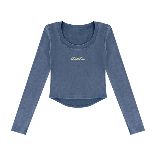 A blue long-sleeve crop top with a scoop neck and a small gold 'Breathe' logo on the chest, displayed on a clean white background.